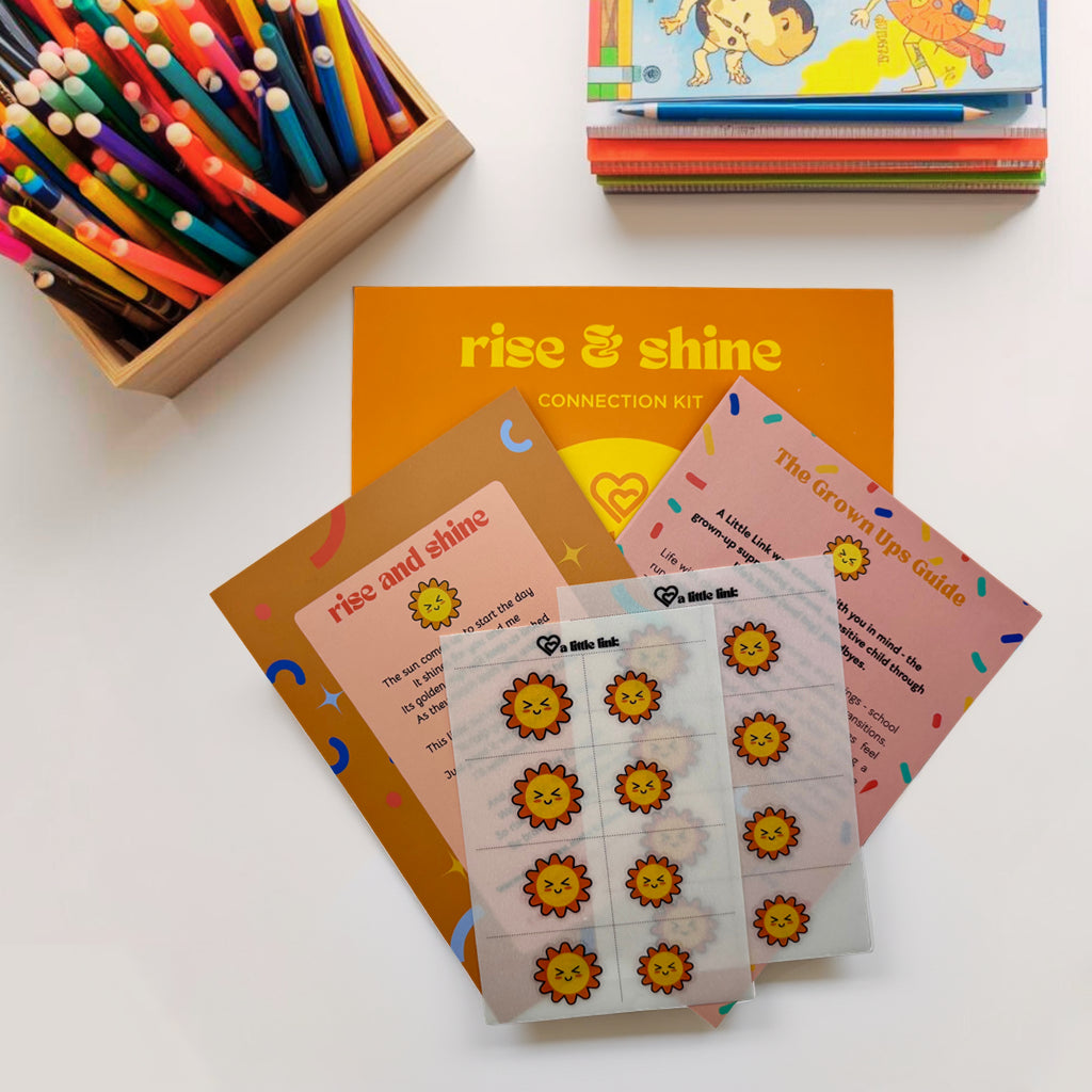 Little Link Rise and Shine kit including matching tattoos, connection card, and caregiver guide to support calm morning transitions